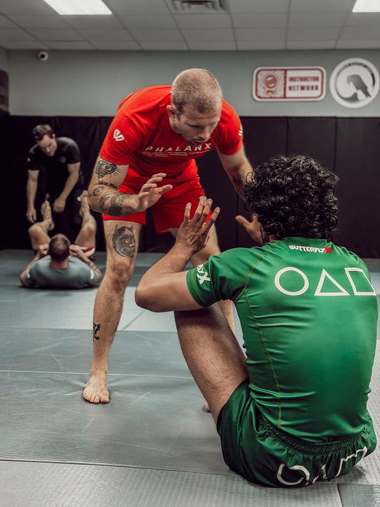 Two students training Jiu Jitsu at corvo martial arts